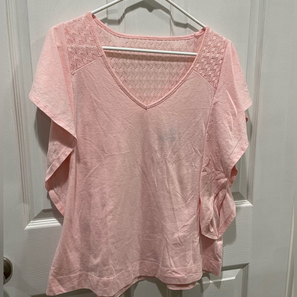 Lane Bryant light pink top with fluttering sleeves.